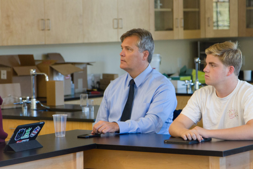 Rich Ryan '83 joins students in science class during his visit to campus.