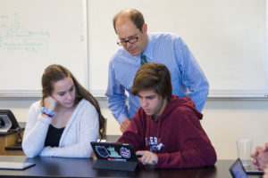 New Hampton students analyze results from a recent biology lab.