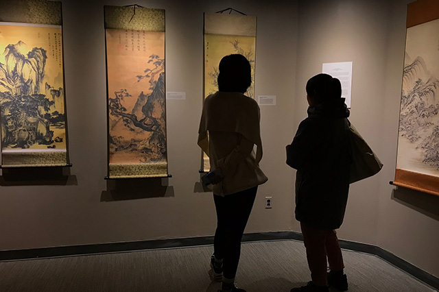 Dorothy Li curated an exhibit with artwork from Forbidden City museum in China.