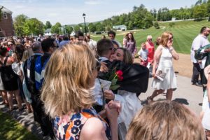 Faculty and students say farewell after the closing of Commencement 2018.