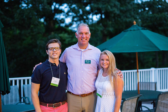 Head of School Joe Williams with co-presidents Johnny and Kelly at an August welcome dinner.