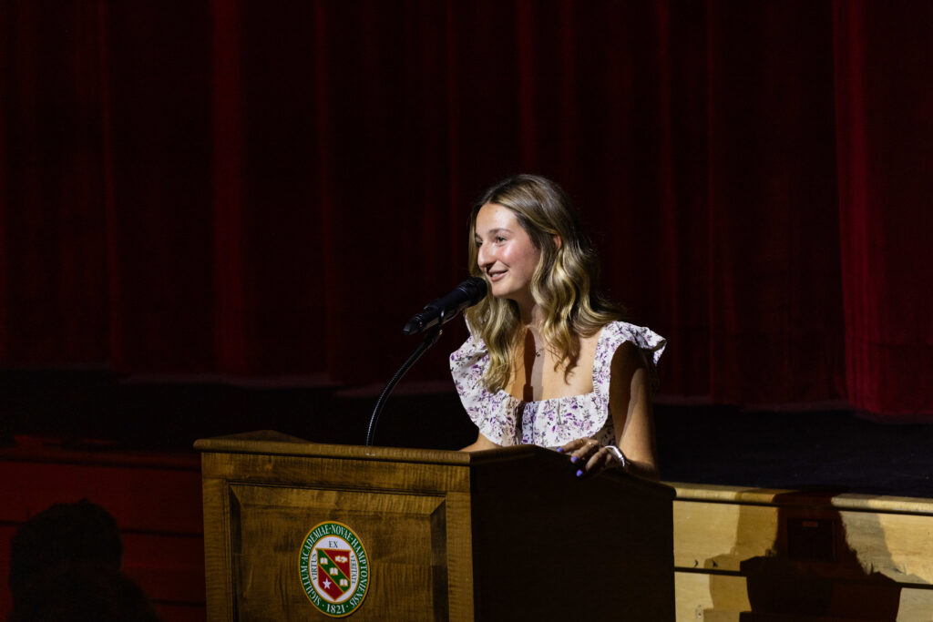 Avery '27 speaks about "Finding a Home at New Hampton" at Community Meeting in September 2025.